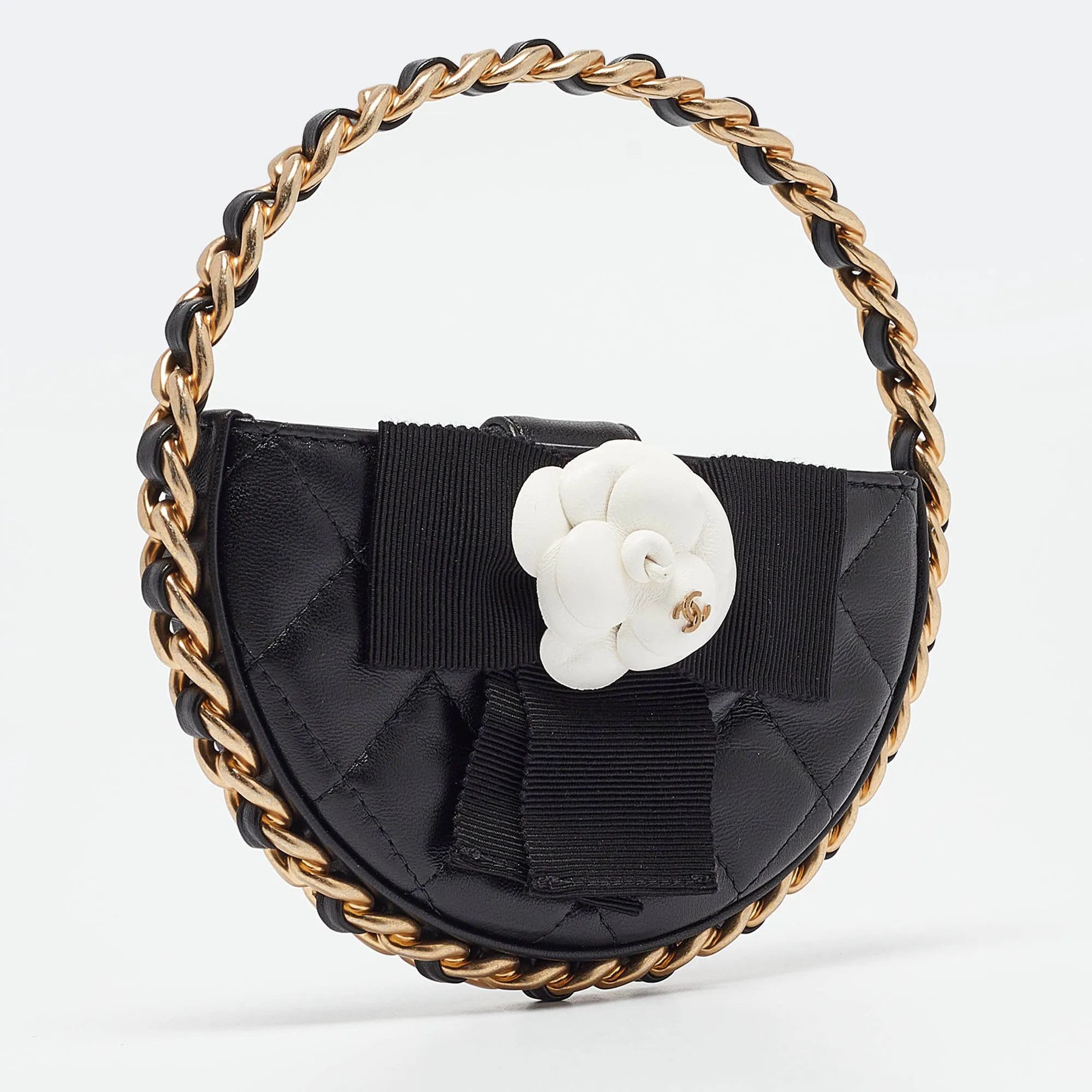 CHANEL Black Quilted Leather Mini Round Camellia Clutch